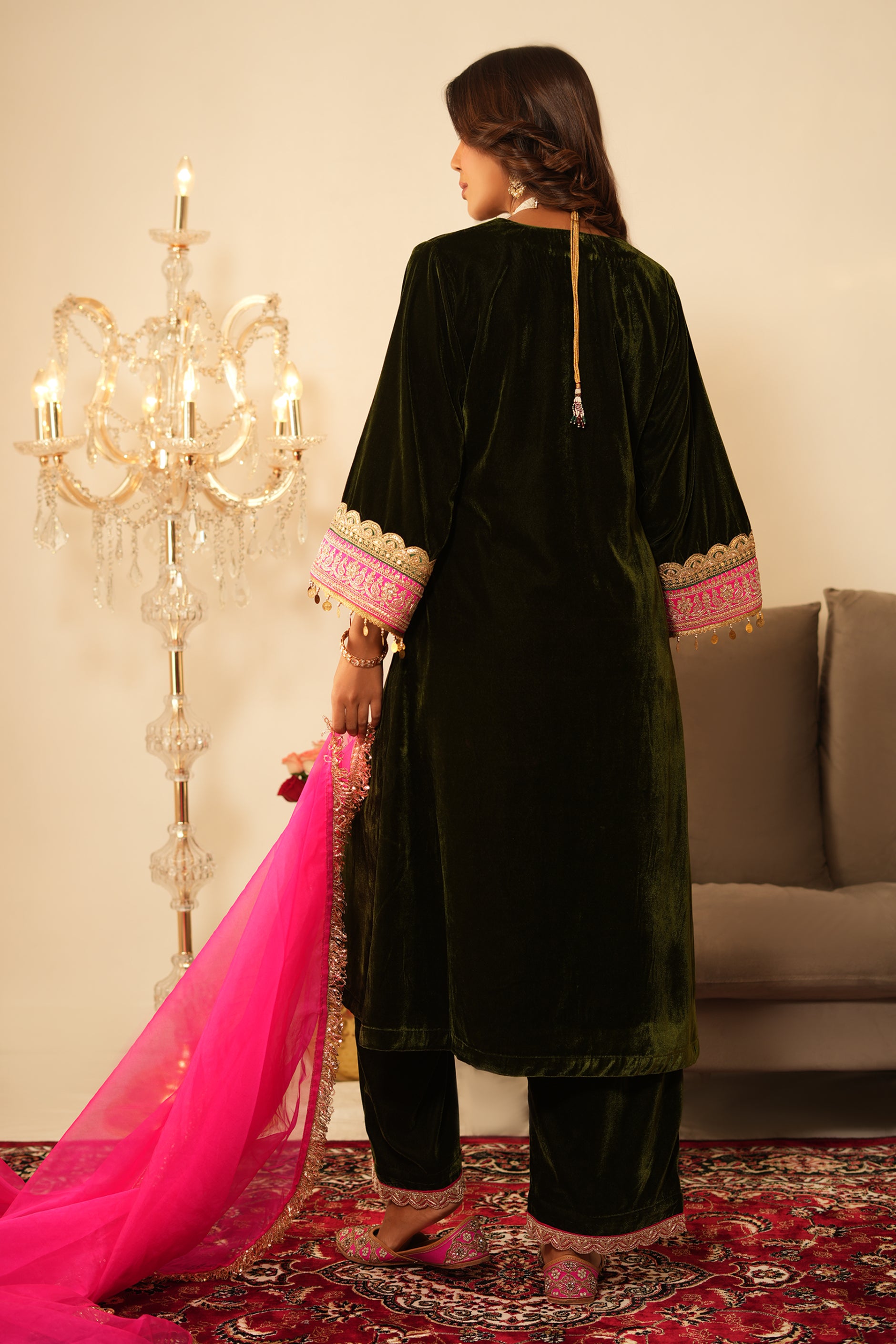 Woman wearing Mehendi Green Gota Lace Velvet Kurta with Pant and contrast organza pink dupatta 