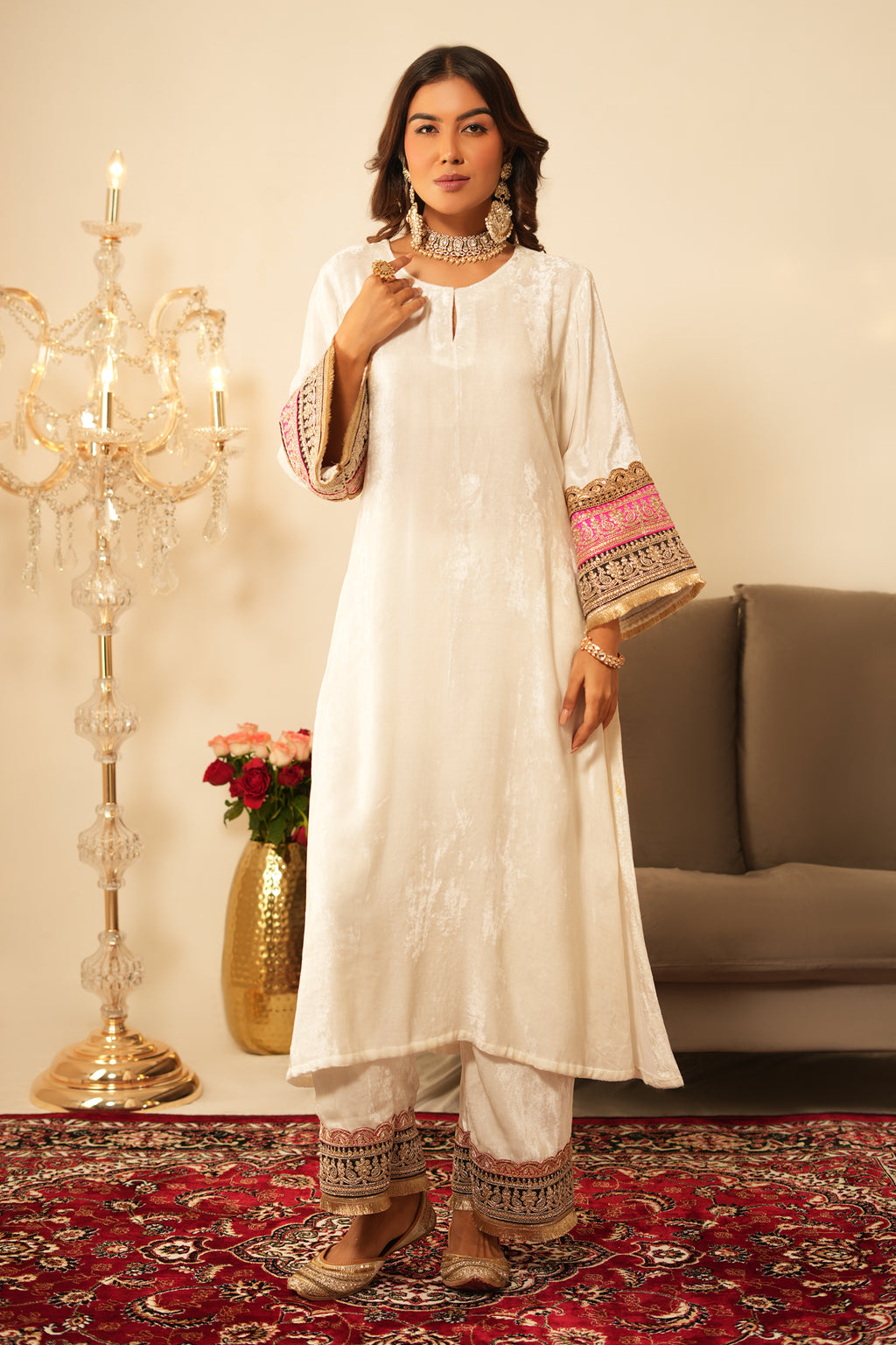 Woman wearing Ivory Gota Lace Velvet Kurta with Pants 