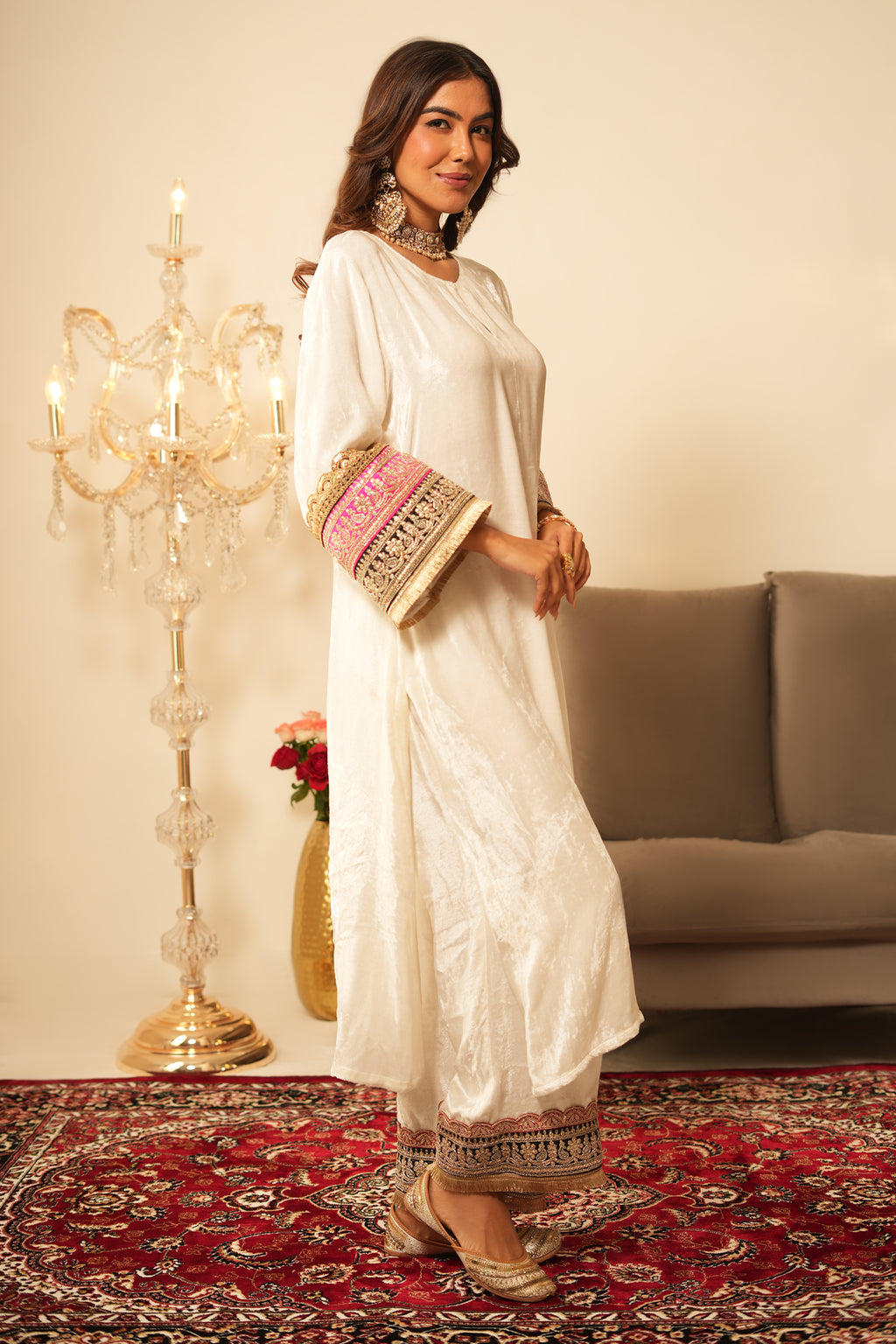 Woman wearing Ivory Gota Lace Velvet Kurta with Pants 