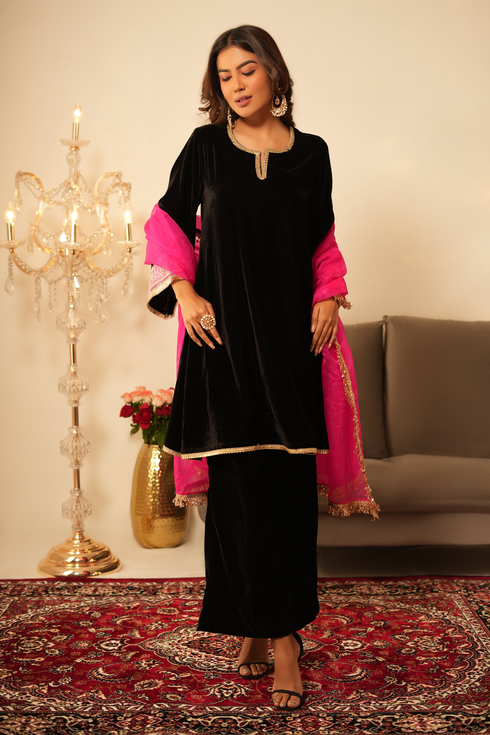Woman in Black Gota Lace Velvet Kurta with Pants and contrast pink organza dupatta