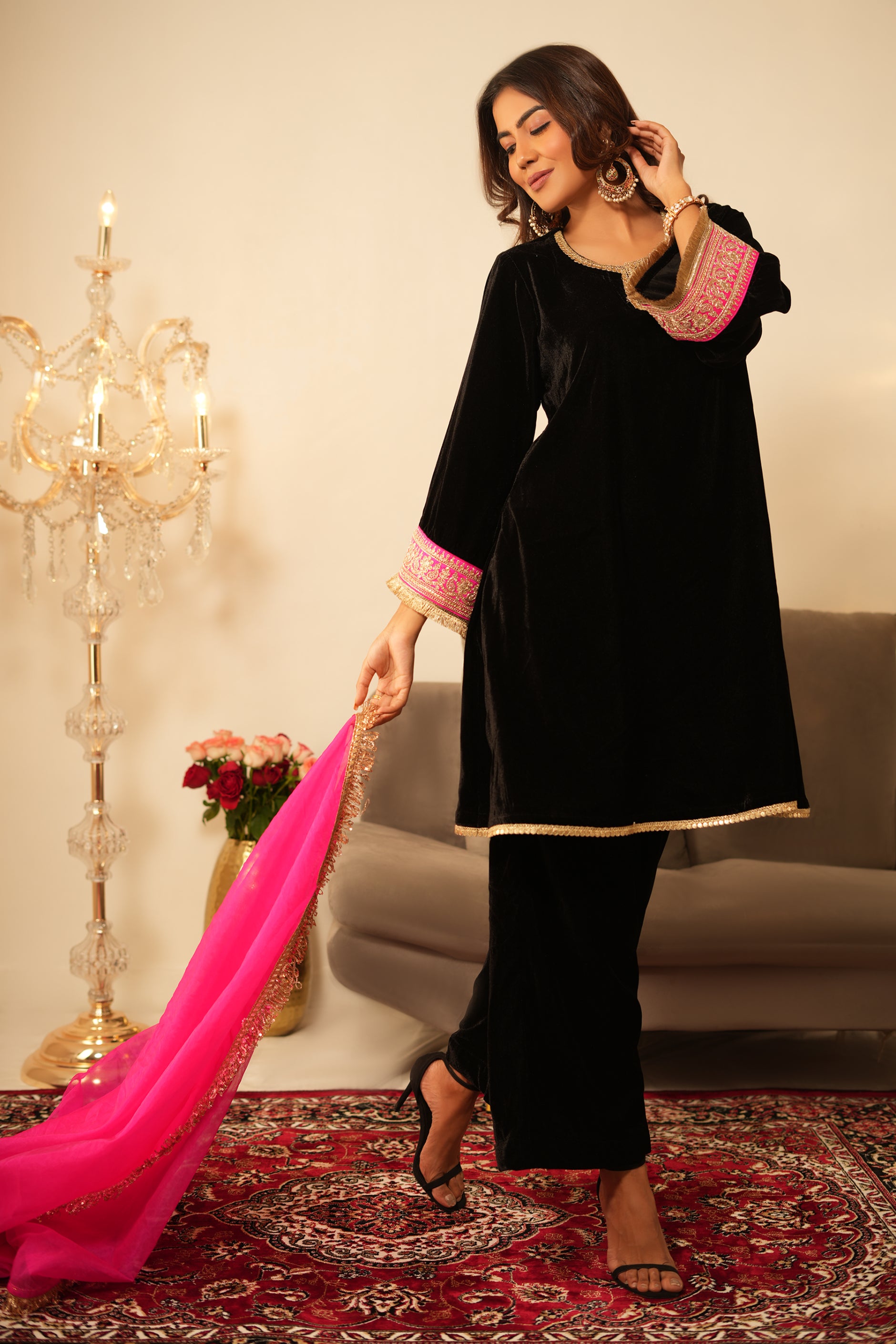 Woman in Black Gota Lace Velvet Kurta with Pants and contrast pink organza dupatta