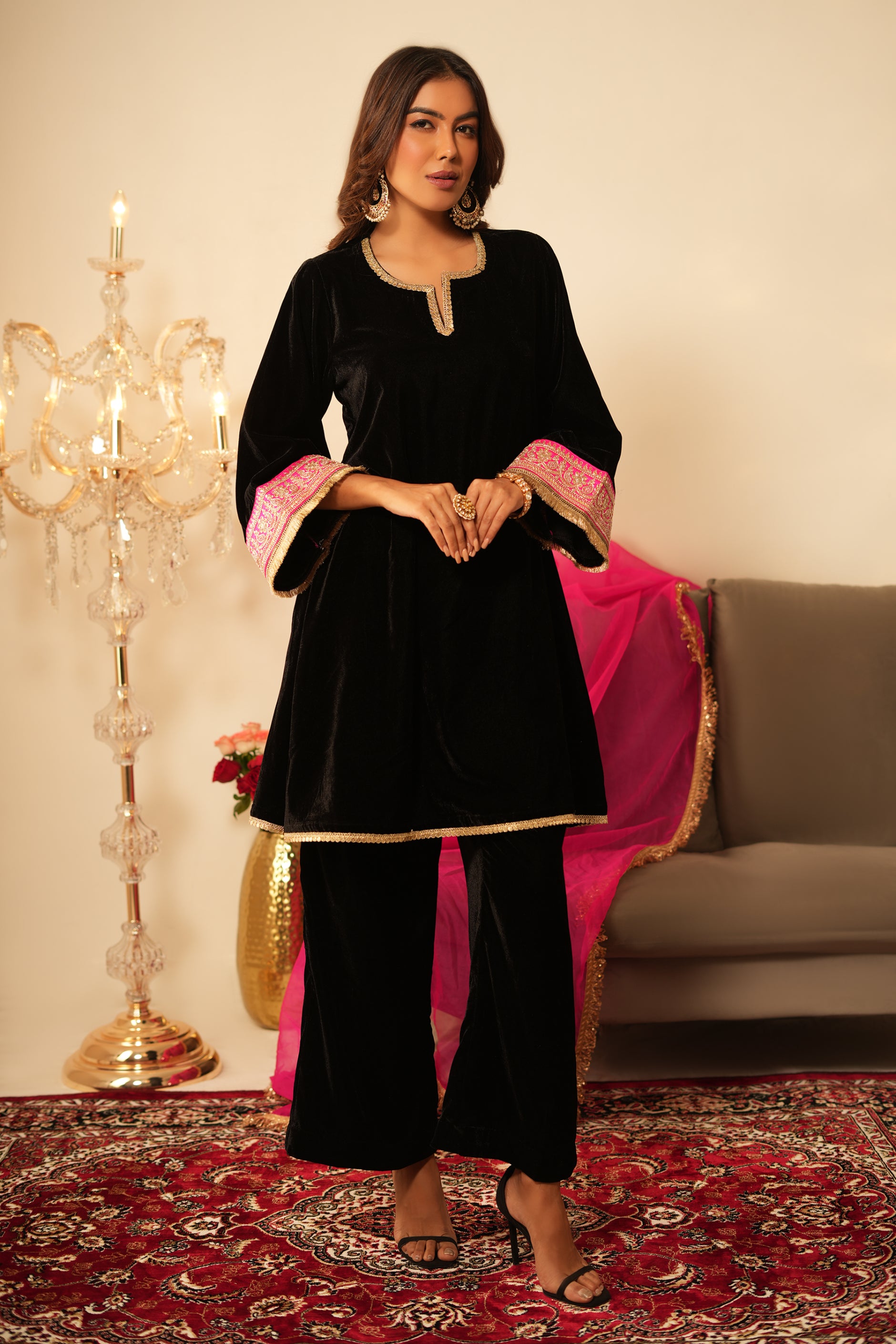 Woman in Black Gota Lace Velvet Kurta with Pants and contrast pink organza dupatta
