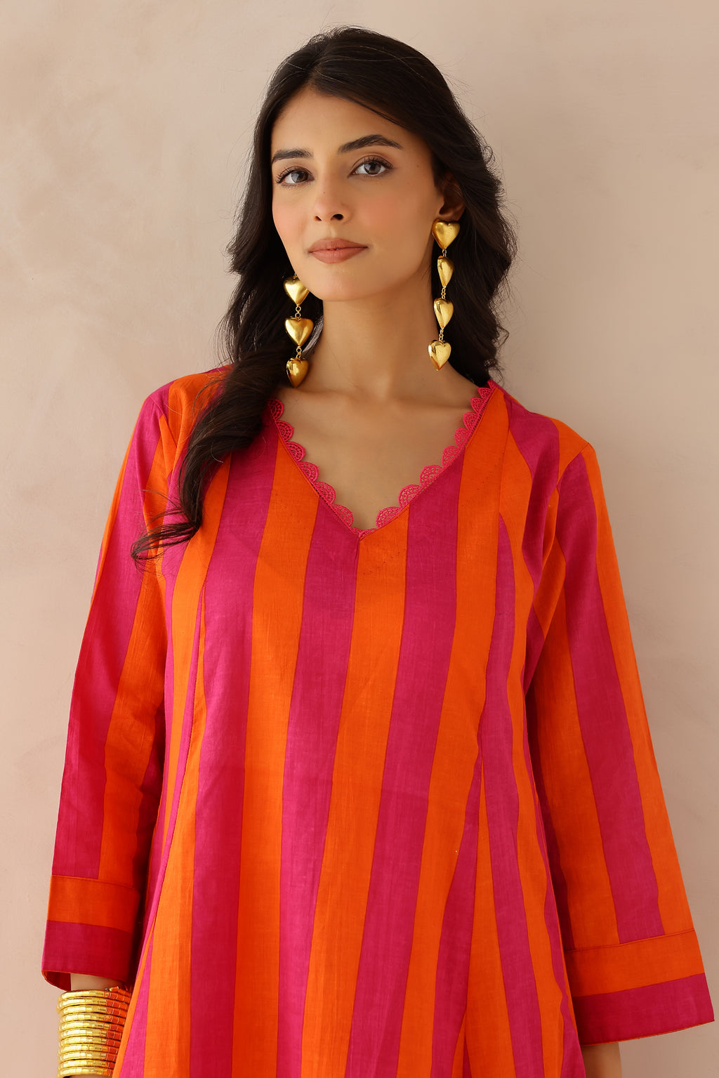 Orange Pink Striped Cotton Kurta with Palazzo Set of 2 for women featuring V neckline, 3/4th sleeves, lace detailing, and matching striped palazzo with elastic waist
