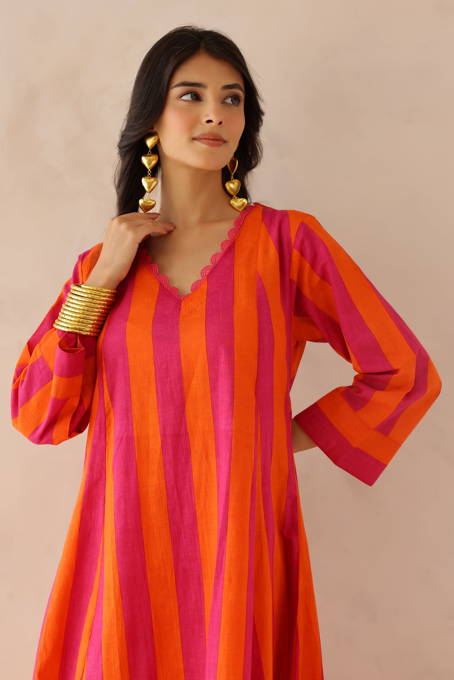 Orange Pink Striped Cotton Kurta with Palazzo Set of 2 for women featuring V neckline, 3/4th sleeves, lace detailing, and matching striped palazzo with elastic waist